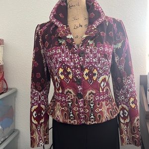 Beautiful multicolored jacket with light turquoise inner lining.